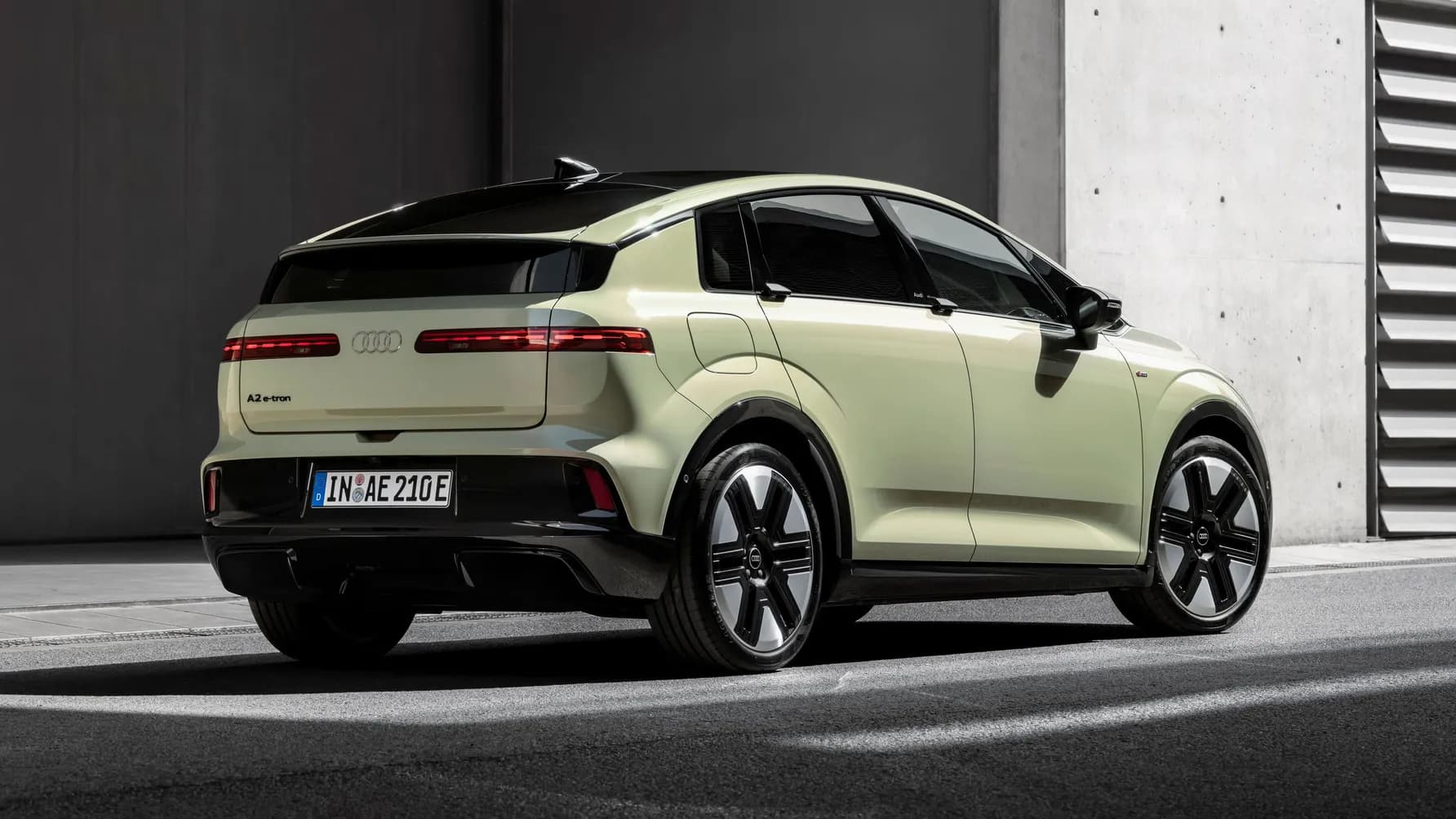 aerodynamic compact electric car silhouette low drag ambiance